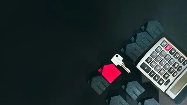 House model, key, and calculator representing insurance policy, billing, and claims platforms